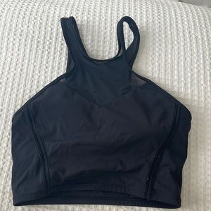 Lululemon black sports bra top with mesh detail. Size 8